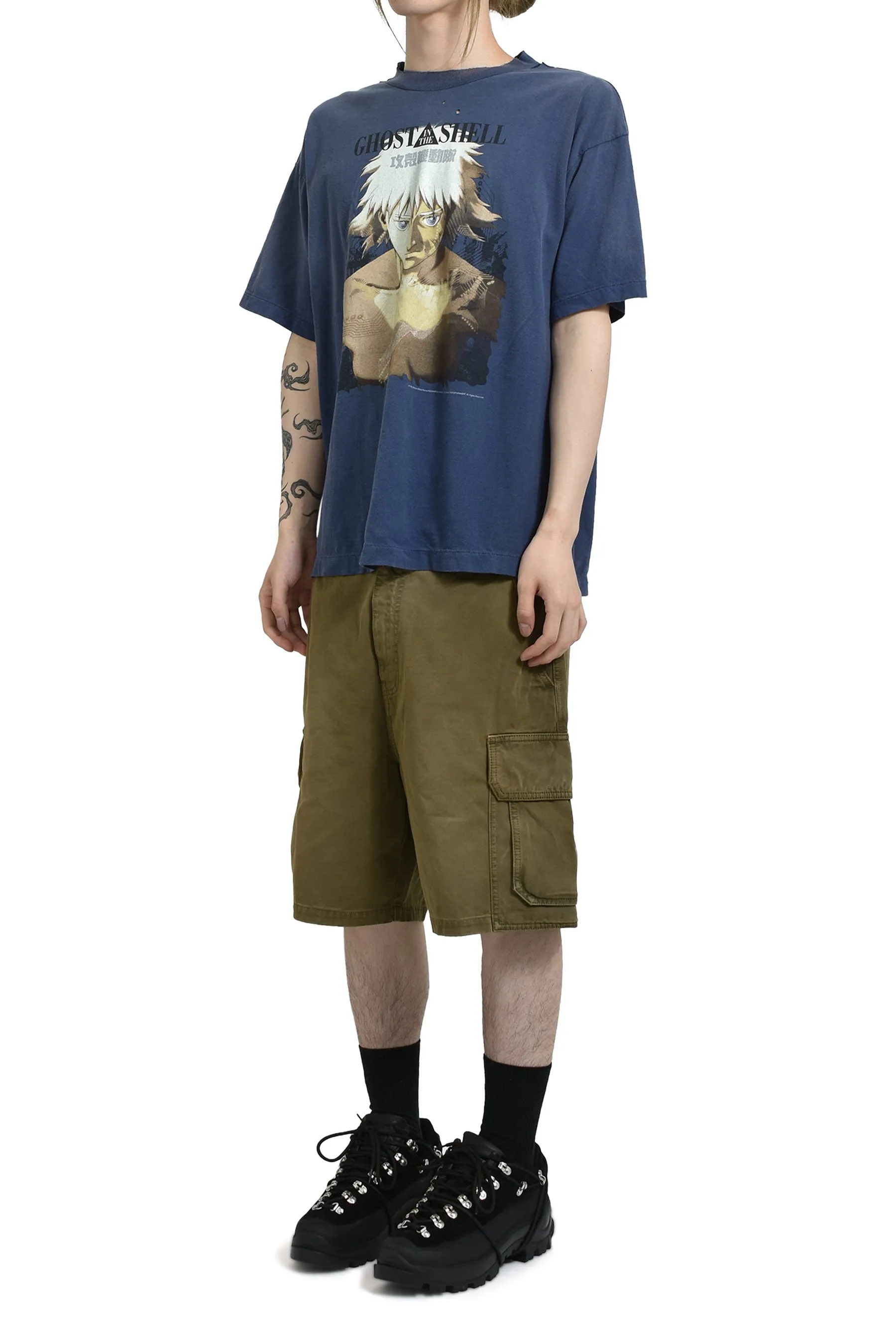 SAINT Mxxxxxx × Ghost in the Shell GS_SS TEE/GST IN THE SHELL/NVY Ghost in the Shell co-branded distressed short-sleeves White-haired plain character TEE Washed blue S-XL Look for the cylindrical fabric with no side seams. The open width is almost meaningless Asut ready-made garments dyed The whole piece is sprayed with horsetail. The collar and cuffs are faded. The collar and cuffs are frayed. Many hangings are worn. The oversized printing position restores the authenticity level. Customized joint main mark/wash mark/with little angel anti-counterfeiting mark